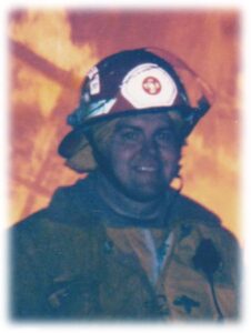 The author Chris Whaley in the 1990's, serving as Firefighter and Safety Officer for the Paulette Volunteer Fire Department